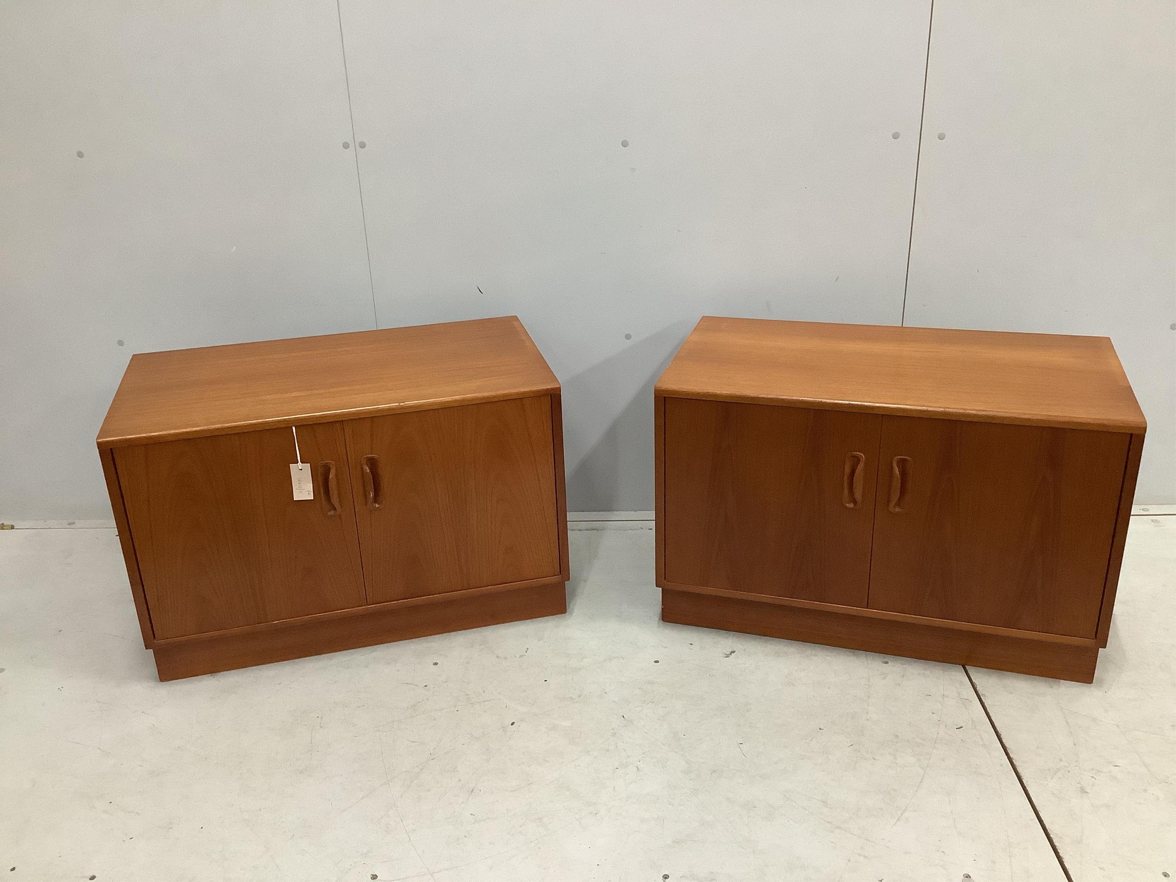 A pair of mid century G Plan teak low cabinets, width 81cm, depth 46cm, height 54cm. Condition - good